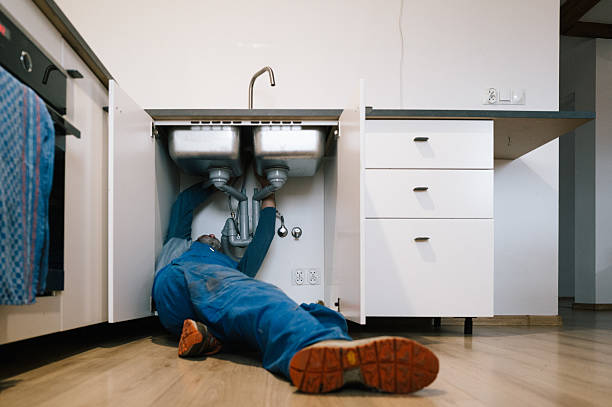 Professional Drain Cleaning technician working in Camp Lake, WI